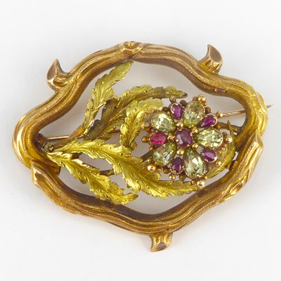 Lot 1087 - A 19th century gold brooch with floral centre...