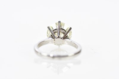 Lot 22 - A platinum and diamond solitaire ring, the six...