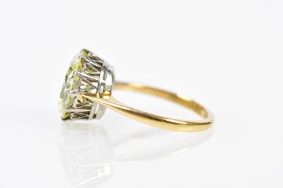 Lot 23 - An 18ct yellow gold diamond solitaire ring,...