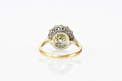 Lot 23 - An 18ct yellow gold diamond solitaire ring,...