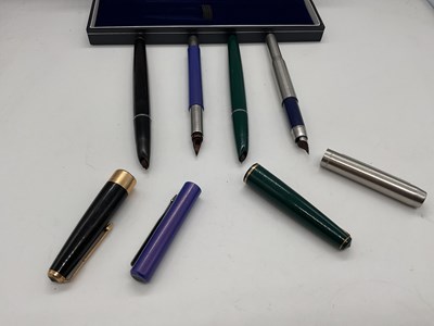 Lot 48 - Four Parker pens (af)