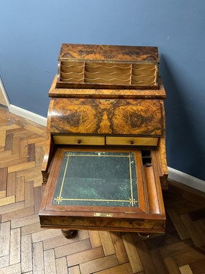 Lot 6543 - A Victorian walnut piano top Davenport, the...