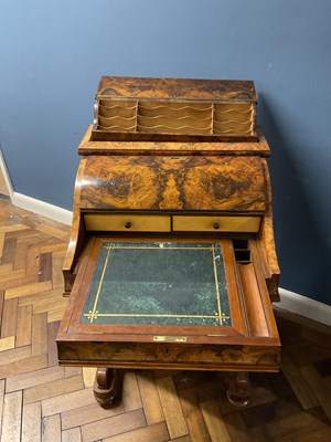 Lot 6543 - A Victorian walnut piano top Davenport, the...