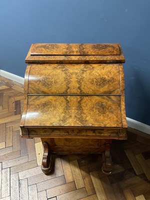 Lot 6543 - A Victorian walnut piano top Davenport, the...