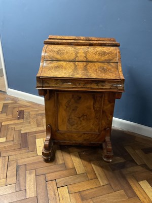 Lot 6543 - A Victorian walnut piano top Davenport, the...