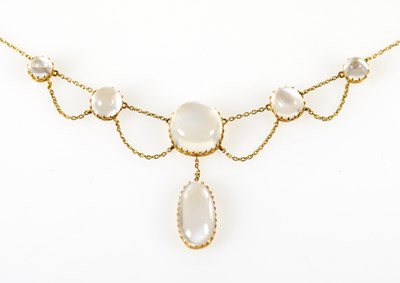 Lot 369 - An Edwardian yellow metal moonstone necklace...