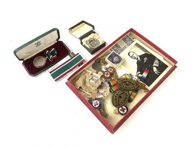 Lot 5133 - RED CROSS; a collection of medals and badges...