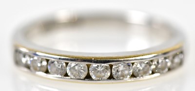 Lot 196 - An 18ct white gold diamond set nine stone...