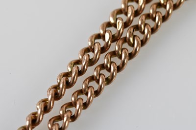 Lot 5 - A 9ct rose gold graduated double Albert chain...