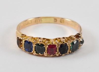 Lot 916 - A 15ct yellow gold half eternity rainbow ring...