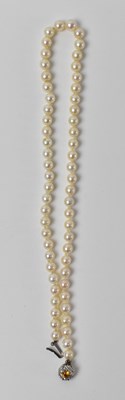 Lot 859 - A 9ct white gold mounted pearl necklace set...