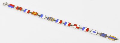 Lot 525 - A white metal and enamel Olympic thirteen flag...