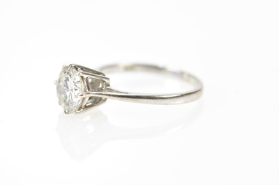 Lot 28 - An 18ct white gold diamond solitaire ring, the...