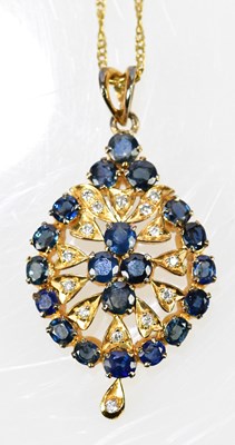 Lot 422 - A yellow metal pierced pendant suspended on a...