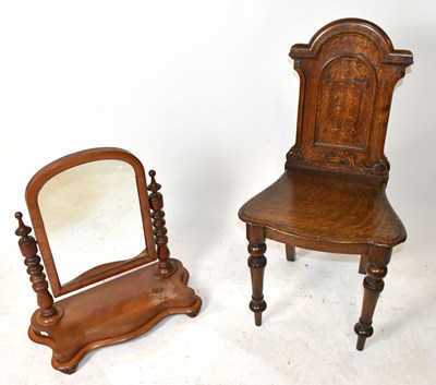 Lot 1594 - A Victorian carved oak hall chair with...
