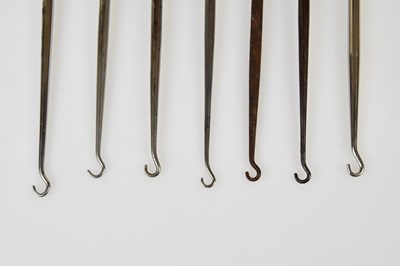 Lot 2491 - Six hallmarked silver handled button hooks and...