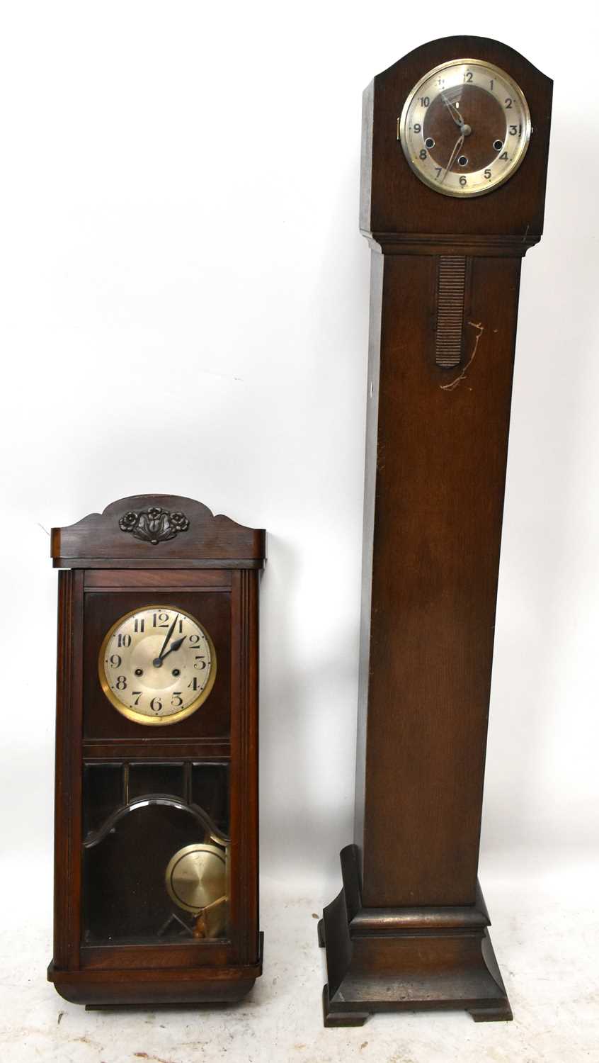 Lot 1411 - An early 20th century oak grandmother clock,...