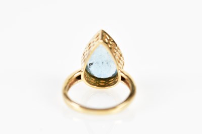 Lot 43 - An 18ct yellow gold and aquamarine ring, the...