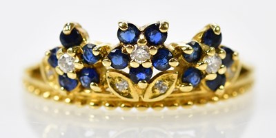 Lot 302 - An 18ct yellow gold sapphire and diamond ring,...