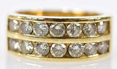 Lot 148 - A 14ct yellow gold diamond set two row half...