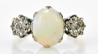 Lot 189 - An 18ct yellow gold opal and illusion set...