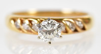 Lot 149 - A 14ct yellow gold diamond solitaire ring, the...