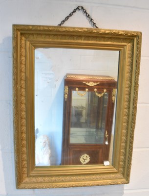 Lot 52 - A late 19th century gilt framed wall mirror,...