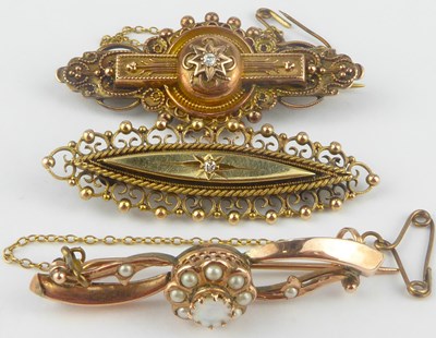 Lot 1079 - Three 19th century brooches comprising a 9ct...