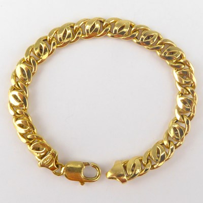 Lot 1071 - An Italian 18ct gold fancy link bracelet with...