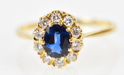 Lot 120 - An 18ct yellow gold sapphire and diamond oval...