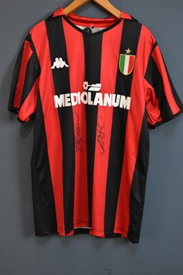 Lot 5275 - AC MILAN; a retro-style football shirt, signed...