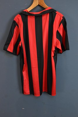 Lot 5275 - AC MILAN; a retro-style football shirt, signed...