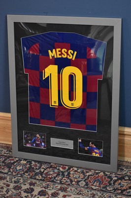 Lot 5264 - LIONEL MESSI; a signed Barcelona football...