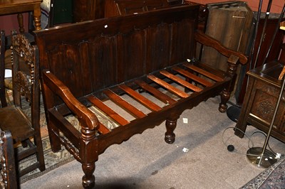 Lot 175 - A 19th century settle with panel back on...