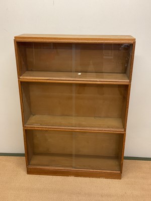 Lot 628 - A stackable solicitor's cabinet and glazed...