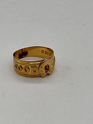 Lot 416 - An 18ct yellow gold 'Good Luck' ring set with...