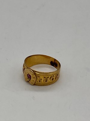 Lot 416 - An 18ct yellow gold 'Good Luck' ring set with...