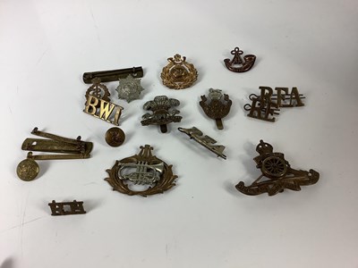 Lot 5141 - A small collection of army badges, to include...
