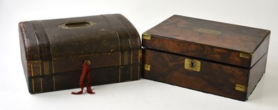 Lot 256 - A Victorian leather dome top writing slope...