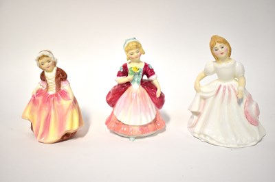 Lot 623 - ROYAL DOULTON; three figurines, HN2996 'Amanda'...