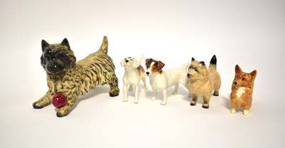 Lot 562 - BESWICK; five small figures of dogs including...