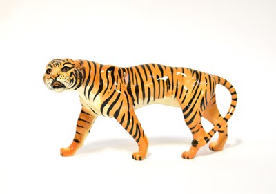 Lot 555 - BESWICK; a small figure of a tiger.