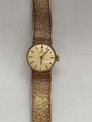 Lot 482 - OMEGA; a lady's vintage 9ct yellow gold...