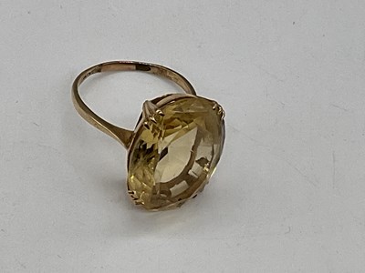 Lot 422 - A 9ct yellow gold citrine dress ring, size L,...