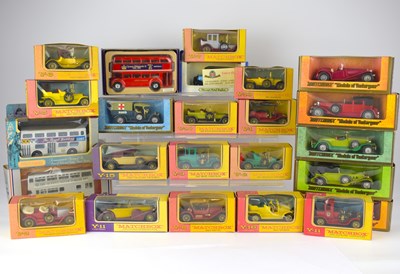 Lot 412 - Twenty-four boxed diecast vehicles, to include...