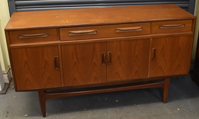 Lot 27 - G-PLAN; a teak mid century sideboard, with...