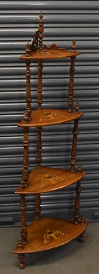 Lot 65 - A Victorian inlaid walnut four tier corner...