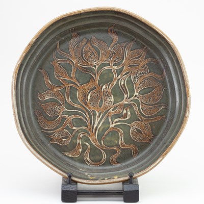 Lot 436 - A large stoneware dish with floral decoration...