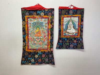 Lot 72 - Two Tibetan silk brocade thangkas with...