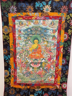 Lot 103 - Two Thangkas, Tibetan silk brocade with...